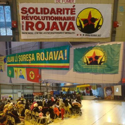 Banderole et drapeau en soutien au Bataillon International de Libération sont déployés.