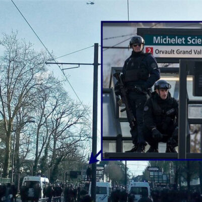 CRS armés de fusils d'assaut