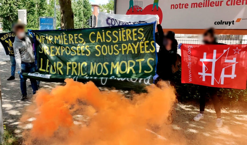 Rassemblement devant le Colruyt