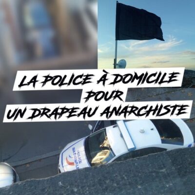 La police intervient pour faire enlever un drapeau anarchiste d'un balcon