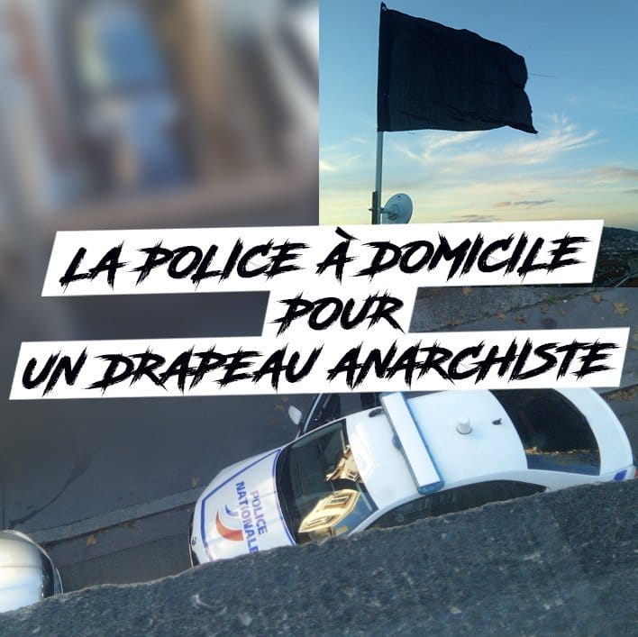 La police intervient pour faire enlever un drapeau anarchiste d'un balcon